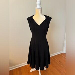 EUC Calvin Klein size 4 black cocktail dress.